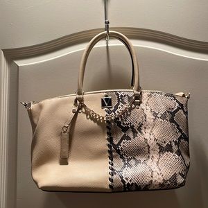 Beige and snakeskin Victoria secret purse.